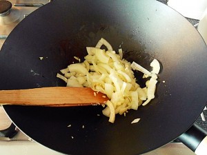 Chicken stir fry: Fry the onion kipkitchen.com #chicken #StirFry #recipe #dinner #healthy