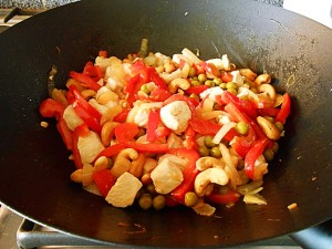 Chicken stir fry: Final wok mix kipkitchen.com #chicken #StirFry #recipe #dinner #healthy