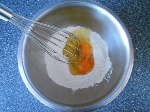 Easy Muffin Recipe with Mango-Add the 2 eggs | kipkitchen.com #muffin #mango #recipe